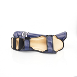 Side view of the navy blue THAISMAI LP184 shin guards, showing the padded shells, light inner lining and adjustable black hook-and-loop straps.