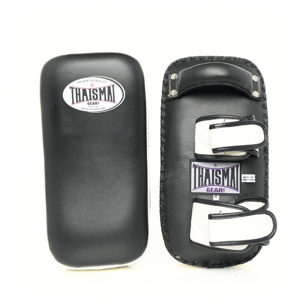Pair of THAISMAI KP142 Muay Thai kick pads in black and white, showing the smooth striking face and rear double-strap system.