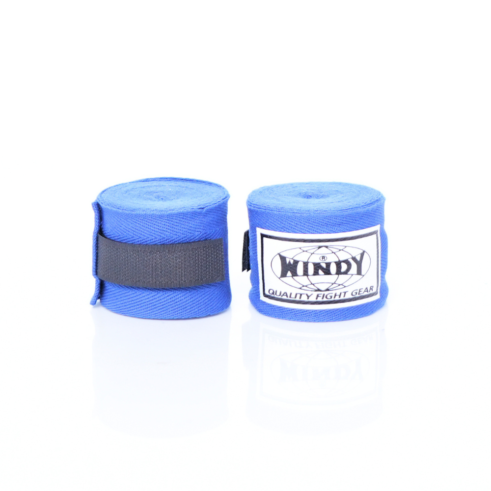 Pair of rolled blue Windy hand wraps showing the logo label and closure strap