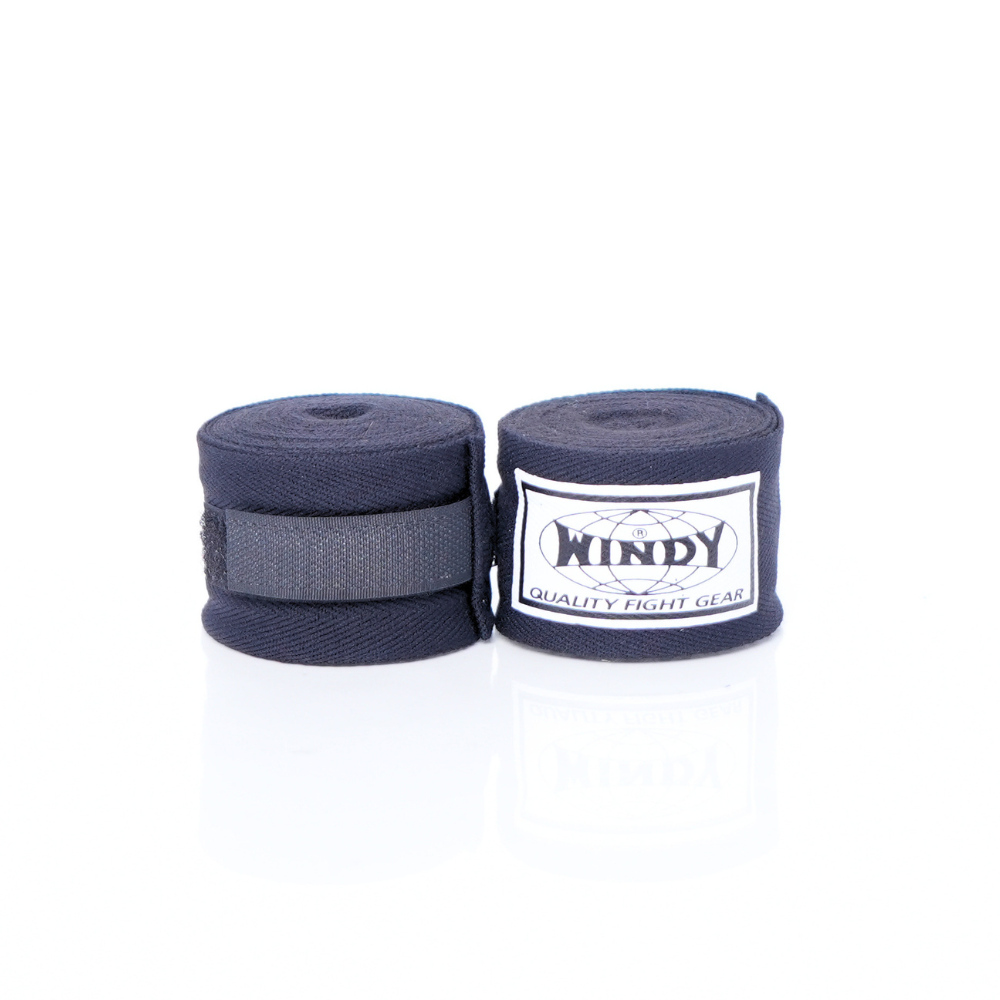 Pair of rolled black Windy hand wraps showing the logo label and closure strap