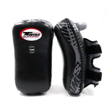 Twins Special KPL-12 Deluxe kicking pads in black and gray with dense impact padding, curved striking surface and secure dual-strap hand compartments for Muay Thai and kickboxing training on a white background