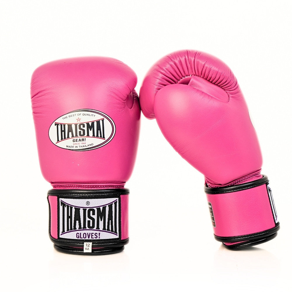 Pair of pink THAISMAI BG124 boxing gloves angled together, one showing the white THAISMAI logo and one showing the palm, against a white background.