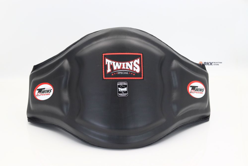 Twins Special black motorcycle tank cover with curved protective design and circular logo on a white background