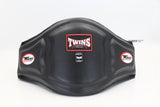 Twins Special black motorcycle tank cover with curved protective design and circular logo on a white background