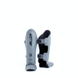 Arwut SG4 The Ascent Muay Thai and MMA shin guards in genuine leather with extra-thick lightweight foam, reinforced instep and Velcro closure on a white background