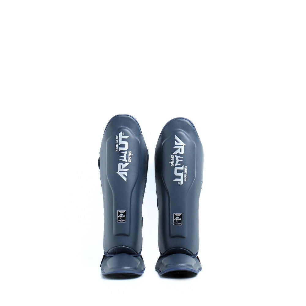 Arwut SG4 The Ascent Muay Thai and MMA shin guards in genuine leather with extra-thick lightweight foam, reinforced instep and Velcro closure on a white background