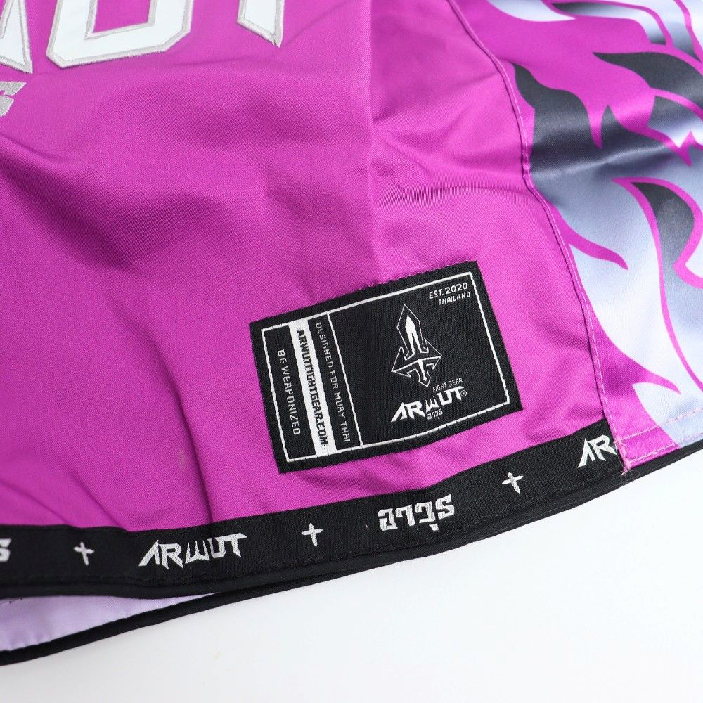 ARWUT BS3 Ascent Edition Muay Thai shorts in lightweight satin with bold Thai boxing artwork, elastic waistband and traditional side-slit cut on a white background