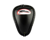 Front view of the black Twins Special GPS-1 Muay Thai steel cup with traditional groin guard shape on a white background