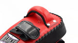 Red boxing glove with black accents on a white background