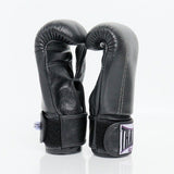 THAISMAI BM111 black genuine leather Muay Thai bag gloves for heavy bag and pad training, pair showing streamlined shape on a white background