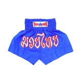 Front view of ThaiSmai BS1003 nylon Muay Thai boxing shorts in blue with red lettering and brand logo, elastic waistband and split-leg cut on a white background