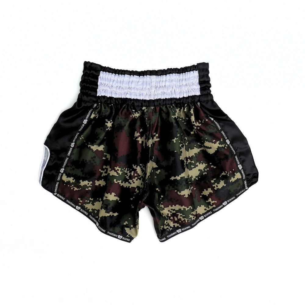 THAISMAI Camo Green Muay Thai shorts in black and green camouflage satin with gold branding, traditional side-slit cut and elastic waistband for boxing and Muay Thai training on a white background