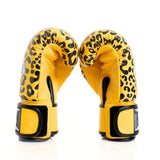 ThaiSmai FBG124 Leopard Muay Thai boxing gloves in genuine leather with yellow-and-black leopard print, padded knuckles and secure wrist support, pair on a white background