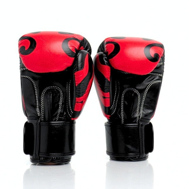 ThaiSmai Flame Muay Thai boxing gloves in black and red genuine leather with high-density foam, ergonomic fist shape and full-wrap Velcro closure on a white background