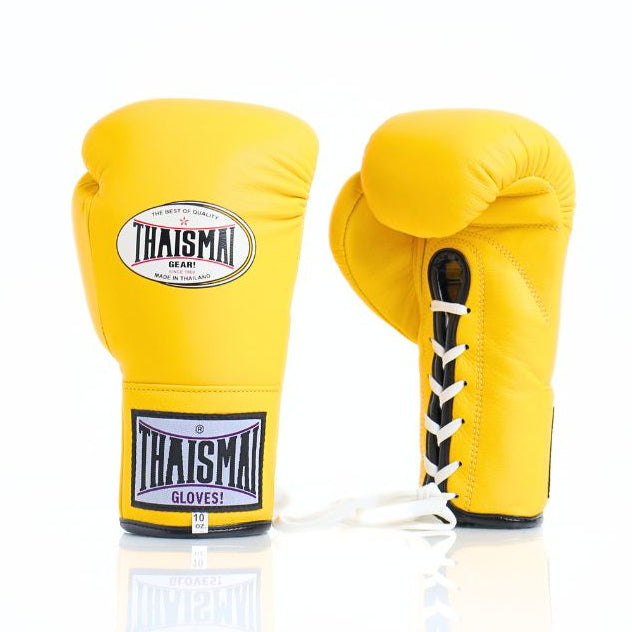 Yellow boxing gloves with Thaismai branding on a white backgroundThaiSmai BG121 lace-up boxing gloves in bright yellow leather with classic lace closure, reinforced multi-layer padding and secure wrist support for boxing and Muay Thai training on a white background