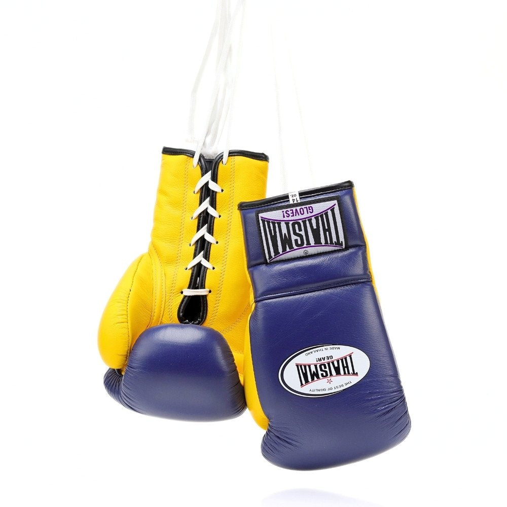 ThaiSmai BG121 lace-up boxing gloves in navy blue and yellow genuine leather with layered foam padding, black laces and secure wrist support for boxing and Muay Thai training on a white background