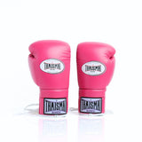 ThaiSmai BG121 lace-up boxing gloves in pink leather with white lace closure, reinforced padding and secure wrist support for boxing and Muay Thai training on a white background
