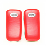 Pair of THAISMAI KP142 Muay Thai kick pads in red and white, with padded striking faces, white trim and double arm straps.