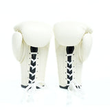 Pair of white boxing gloves with black accents on a white background