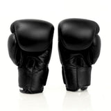 Top King TKBGSA Super Air boxing gloves with lightweight ventilated construction, multi-layer impact padding, ergonomic fist shape and secure hook-and-loop wrist closure for boxing and Muay Thai training on a white background