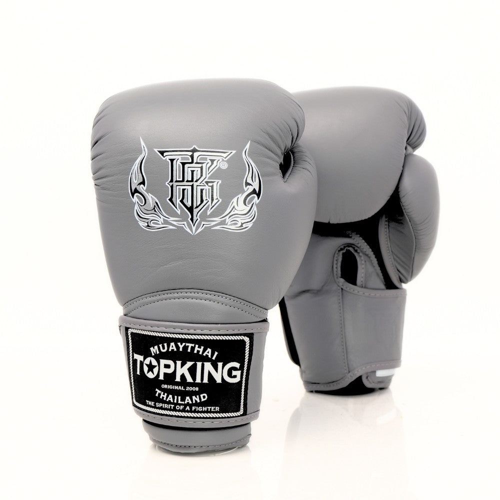 Top King TKBGSA Super Air boxing gloves with lightweight ventilated construction, multi-layer impact padding, ergonomic fist shape and secure hook-and-loop wrist closure for boxing and Muay Thai training on a white background