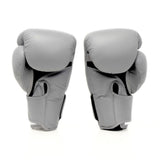 Top King TKBGSA Super Air boxing gloves with lightweight ventilated construction, multi-layer impact padding, ergonomic fist shape and secure hook-and-loop wrist closure for boxing and Muay Thai training on a white background