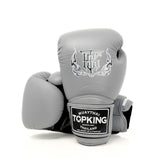Top King TKBGSA Super Air boxing gloves with lightweight ventilated construction, multi-layer impact padding, ergonomic fist shape and secure hook-and-loop wrist closure for boxing and Muay Thai training on a white background