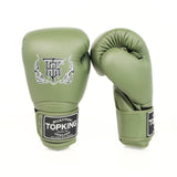 Top King TKBGSA Super Air boxing gloves with lightweight ventilated construction, multi-layer impact padding, ergonomic fist shape and secure hook-and-loop wrist closure for boxing and Muay Thai training on a white background
