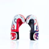 Side view of Twins Special FBGVL4-67 SAK YANT boxing gloves showing the padded glove profile, thumb protection and hook-and-loop wrist fastening on a white background