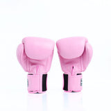 Rear view of a pair of pink Twins Special boxing gloves showing padded knuckles and black hook-and-loop wrist straps on a white background