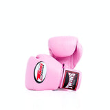 Pair of pink Twins Special boxing gloves arranged at an angle, with the front glove showing the Twins logo and pink wrist patch on a white background