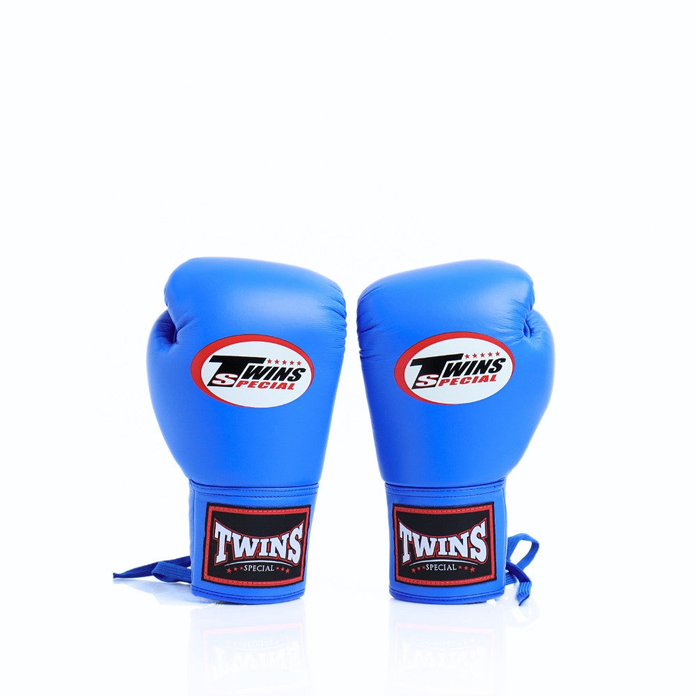 Twins Special BGLL-1 lace-up boxing gloves in premium Thai leather with secure lace closure, attached thumb and competition-style padding for boxing and Muay Thai training on a white background