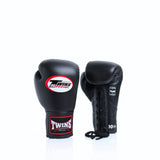 Twins Special BGLL-1 lace-up boxing gloves in premium Thai leather with secure lace closure, attached thumb and competition-style padding for boxing and Muay Thai training on a white background
