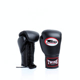 Twins Special BGLL-1 lace-up boxing gloves in premium Thai leather with secure lace closure, attached thumb and competition-style padding for boxing and Muay Thai training on a white background