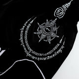 Front view of black and yellow ThaiSmai TIGER Muay Thai shorts with bold tiger artwork, elastic waistband and traditional side-slit cut on a white background