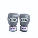 Front view of a pair of gray Windy BGVH leather Muay Thai boxing gloves showing padded knuckles, Windy logos, wrist straps and hook-and-loop closures on a white background