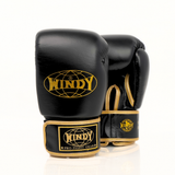 Front view of Windy BGVH black and gold Muay Thai boxing gloves showing padded knuckles, thumb protection, wrist cuffs and Windy branding on a white background