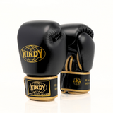 Palm-side view of Windy BGVH black and gold Muay Thai boxing gloves showing stitched leather palms, thumb opening and padded wrist support on a white background