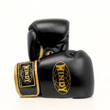 Rear view of Windy BGVH black and gold Muay Thai boxing gloves showing leather panels, wrist cuffs and Windy branding on a white background