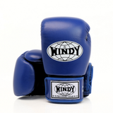 Side view of blue Windy BGVH Muay Thai boxing gloves showing the padded glove profile, thumb guard and extended wrist cuff on a white background