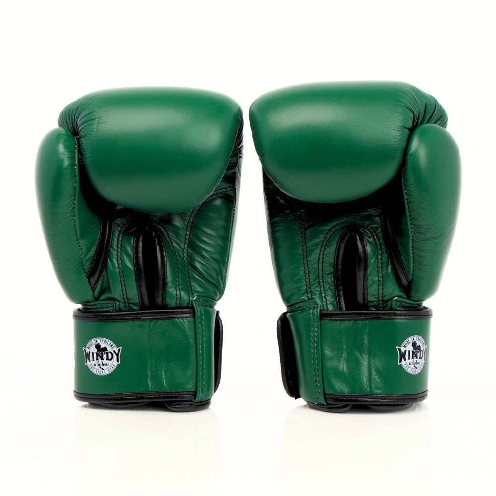 Palm-side view of green Windy BGVH Muay Thai boxing gloves showing stitched leather palms, thumb opening and padded wrist support on a white background