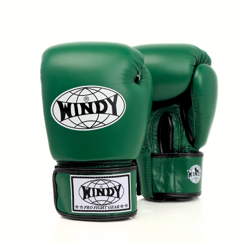 Front view of green Windy BGVH Muay Thai boxing gloves showing padded knuckles, thumb protection, wrist cuffs and Windy branding on a white background