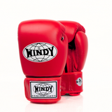 Front and angled view of red Windy BGVH leather Muay Thai boxing gloves showing padded knuckles, Windy logos and red hook-and-loop wrist straps on a white background