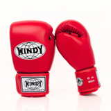 Front view of red Windy BGVH leather Muay Thai boxing gloves showing the padded knuckles, Windy logo patches and red wrist straps on a white background