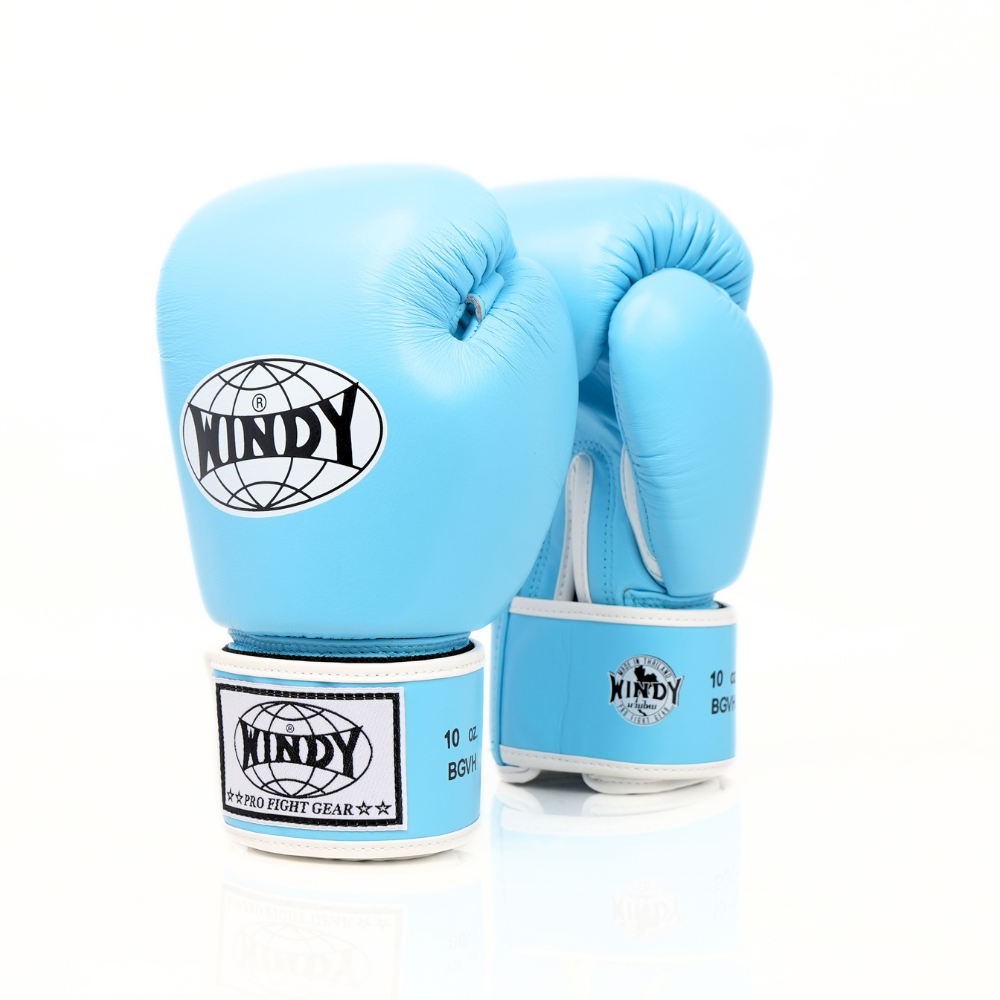 Rear view of light blue Windy BGVH Muay Thai boxing gloves showing leather panels, wrist cuffs and Windy branding on a white background