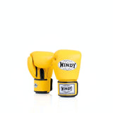 Front view of a pair of yellow Windy BGVH leather Muay Thai boxing gloves showing padded knuckles, black trim, hook-and-loop wrist straps and Windy logos on a white background