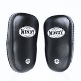 Angled side view of black Windy KP-8 leather kick pads showing single straps, thick curved padding and stitched leather edges on a white background