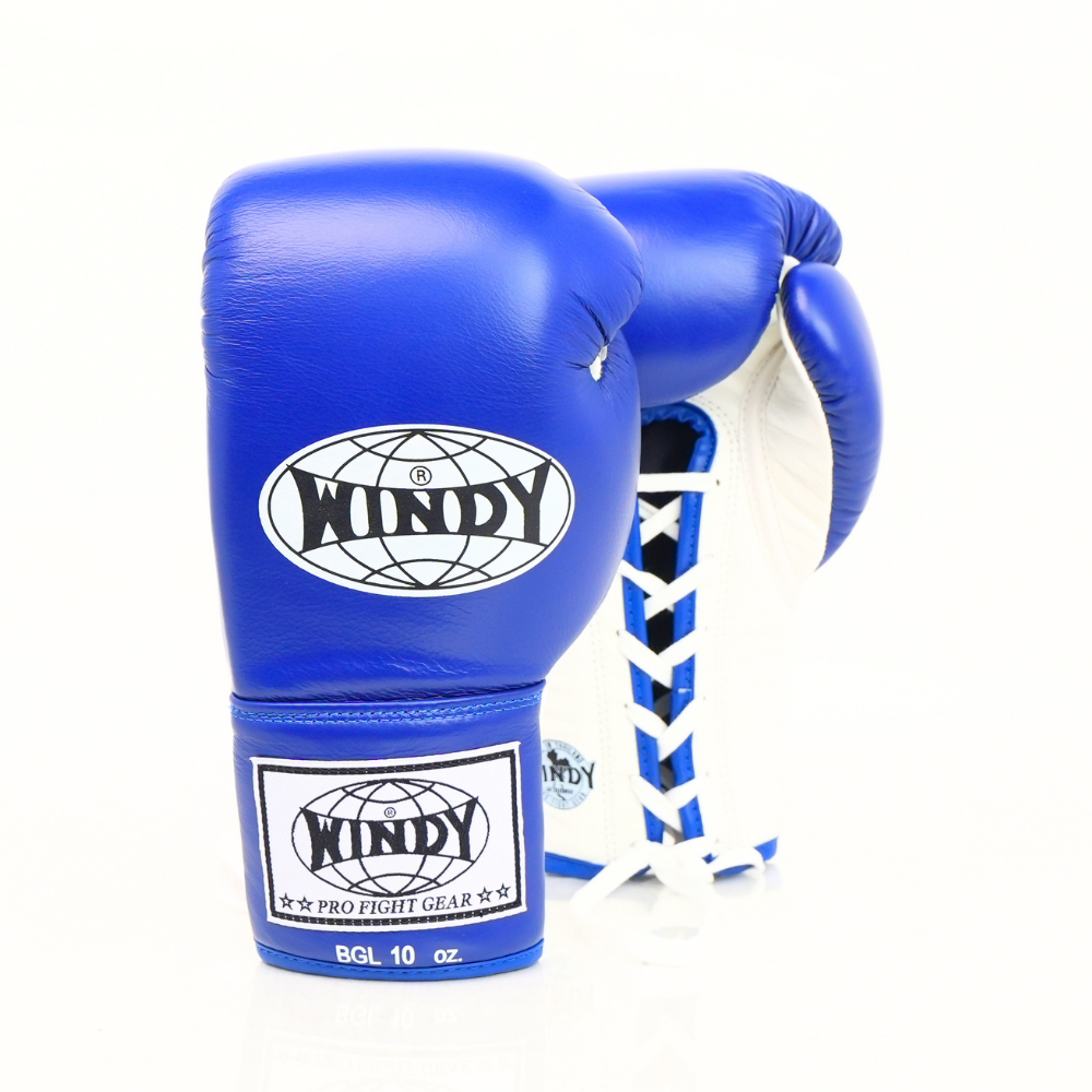 Front view of blue and white Windy BGL lace-up boxing gloves showing padded knuckles, white laces, black trim and Windy branding on a white background