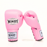 Angled view of pink Windy BGL lace-up boxing gloves showing padded knuckles, white lacing, black trim and extended wrist padding on a white background