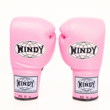 Side view of pink Windy BGL lace-up boxing gloves showing the padded glove profile, lace-up wrist construction and black trim on a white background